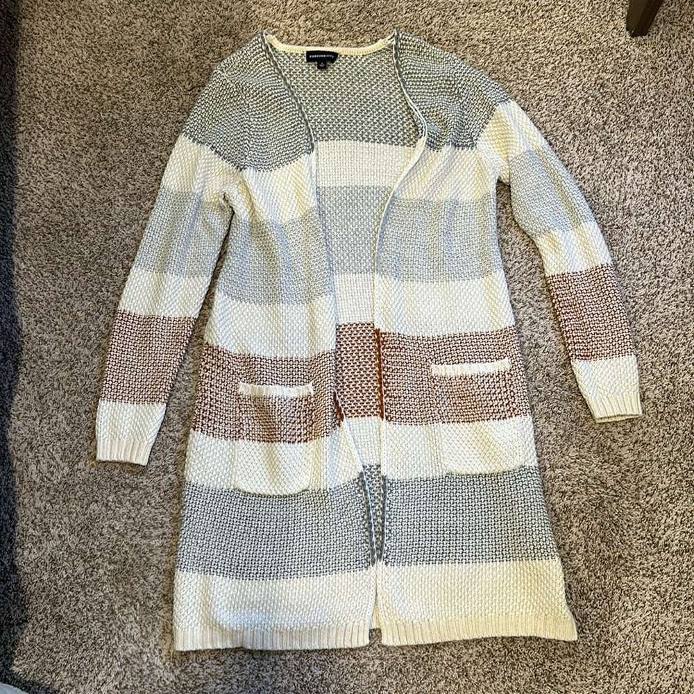 Long knit cardigan. Rust, cream, and grey. Size medium.
